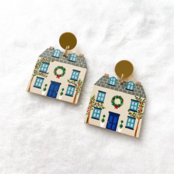 Earrings from Binko Banko in the shape of a house decorated for Chrismtas
