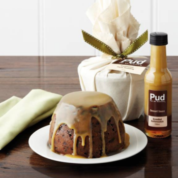 Christmas Pudding covered in Dessert Sauce